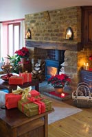 Country living room at Christmas with Poinsettias