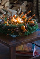 Christmas wreath on wooden coffee table