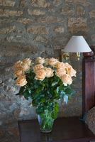 Vase of peach Roses