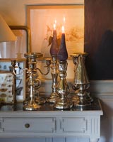 Mercury glass and silver candlesticks