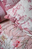 Vintage quilts and cushions