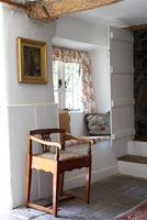 Wooden chair in country hallway