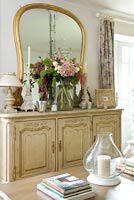 Painted sideboard with floral display