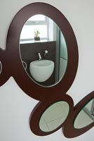 Contemporary mirror in bathroom