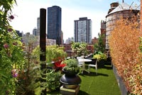 Modern roof terrace with fake grass