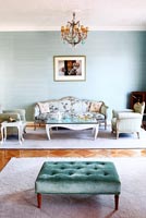 Blue living room with vintage furniture
