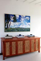 Sideboard and landscape painting