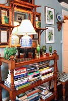 Wooden shelves with books and ornaments