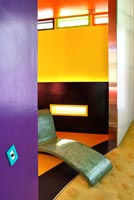 Colourful seating area in conceptual house
