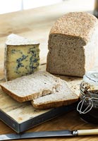Blue cheese and brown bread on board