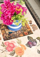 Flower arrangement on patterned coffee table