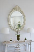 Console table with Orchids, Hyacinths and Willow stems