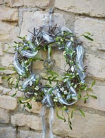Christmas wreath with Mistletoe and ribbon