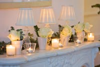 Decorative marble mantlepiece with floral display