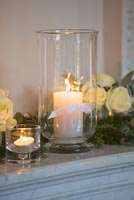 Marble mantlepiece with Roses and candles