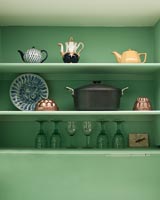 Green kitchen shelves