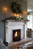 Stone fireplace decorated for christmas