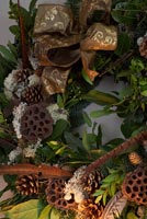 Christmas wreath of Pine cones, Lotus seed heads and feathers