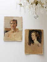 Portraits on white wall