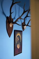 Deer antlers and religious painting