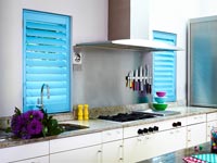 Modern kitchen with turquoise shutters