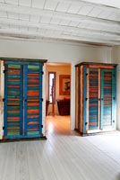 Colourful wooden wardrobes