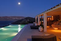 View from luxury swimming pool at night
