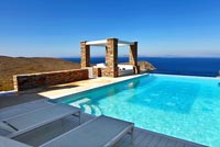Seating area and infinity pool with sea view, Greece