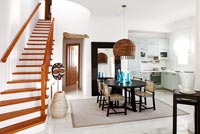 Modern open plan dining room and stairs