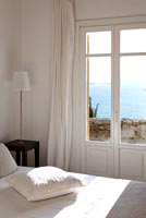 Classic bedroom with view of sea