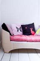 Day bed with colourful cushions