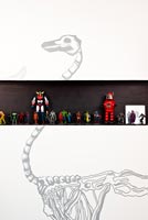 Skeleton artwork by Pascal Péris and figurines display