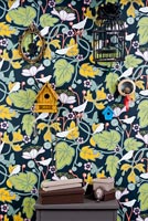 Patterned wallpaper and bird cages