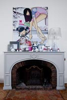 Grey fireplace with modern art