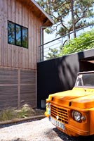 Contemporary wooden house and garage