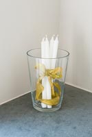 Candles in glass vase