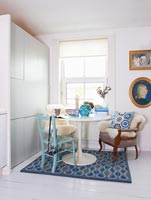 Colourful dining area with vintage furniture