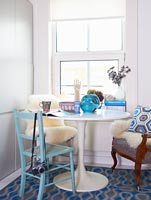 Colourful dining area with vintage furniture