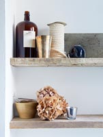 Accessories on wooden shelves