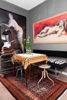 Eclectic dining room with modern art