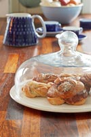 Pastries under glass dome