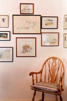 Watercolour paintings and wooden chair