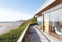 Contemporary home overlooking sea