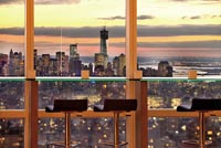 Glass bar with view over New York city