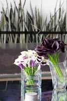Calla Lilies arranged in glass vases