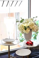 Hydrangea flowers in white vase