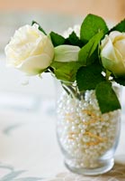 White Roses in glass vase