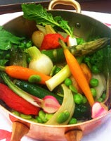 Vegetables in copper saucepan