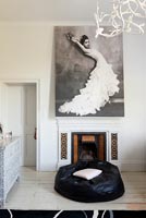 Giant photo above period fireplace 