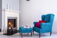 Classic armchair by fire
